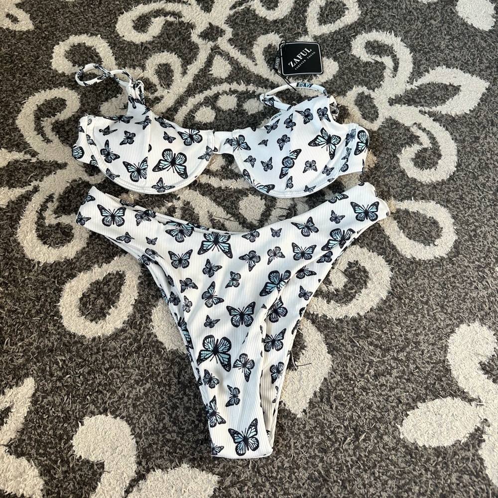 White and blue bikini set with butterfly pattern